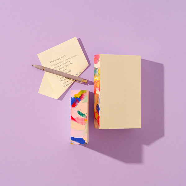 Moglea Candy Swirl Pad Medium notepad with colorful, candy-inspired swirl design and lined pages for writing notes.