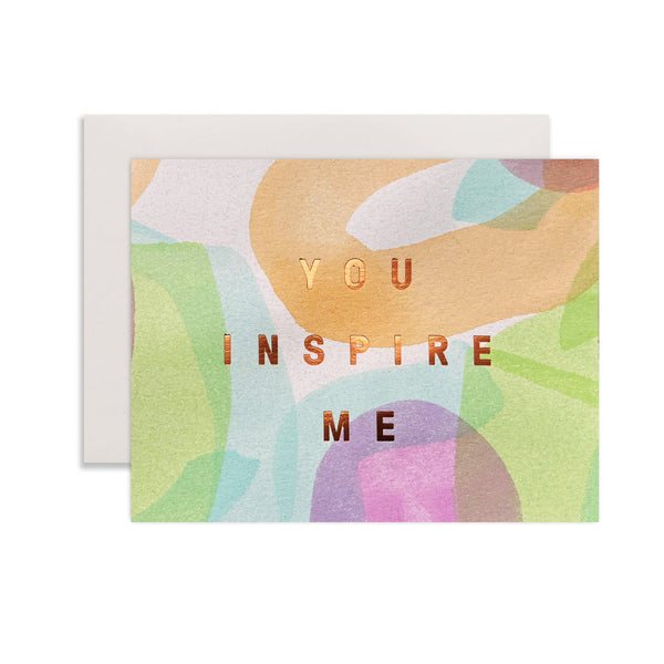 Moglea Inspire Unicorn greeting card featuring a whimsical unicorn illustration on a colorful background.