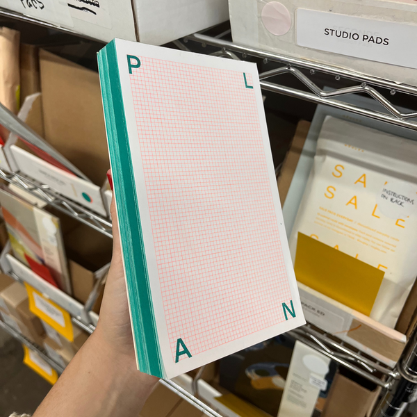 Moglea Studio Pad notepad with blank white pages and colorful cover, ideal for writing and sketching.